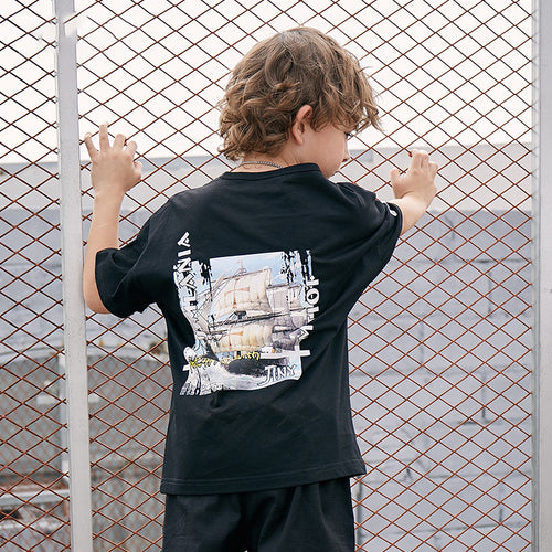 Children's printed T-shirt by Ancient Energy featuring colorful graphic design and comfortable cotton fabric.