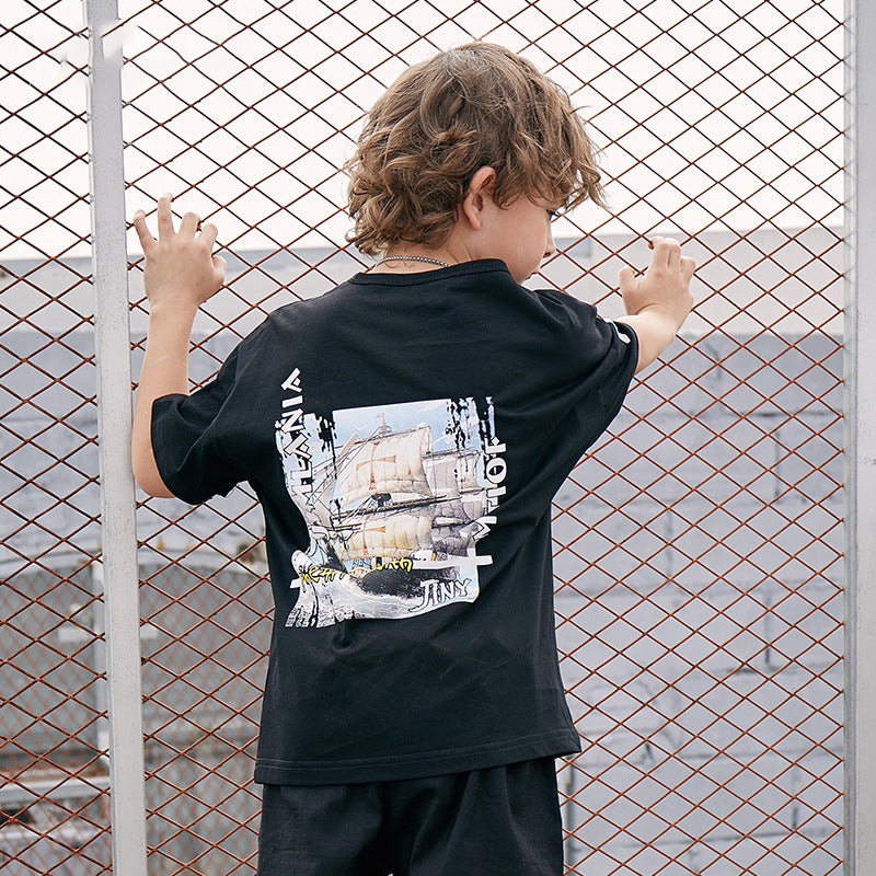 Children's printed T-shirt by Ancient Energy featuring colorful graphic design and comfortable cotton fabric.