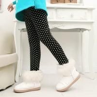 Girls' warm leggings by Ancient Energy, soft and cozy in vibrant colors, perfect for cold weather and active wear.