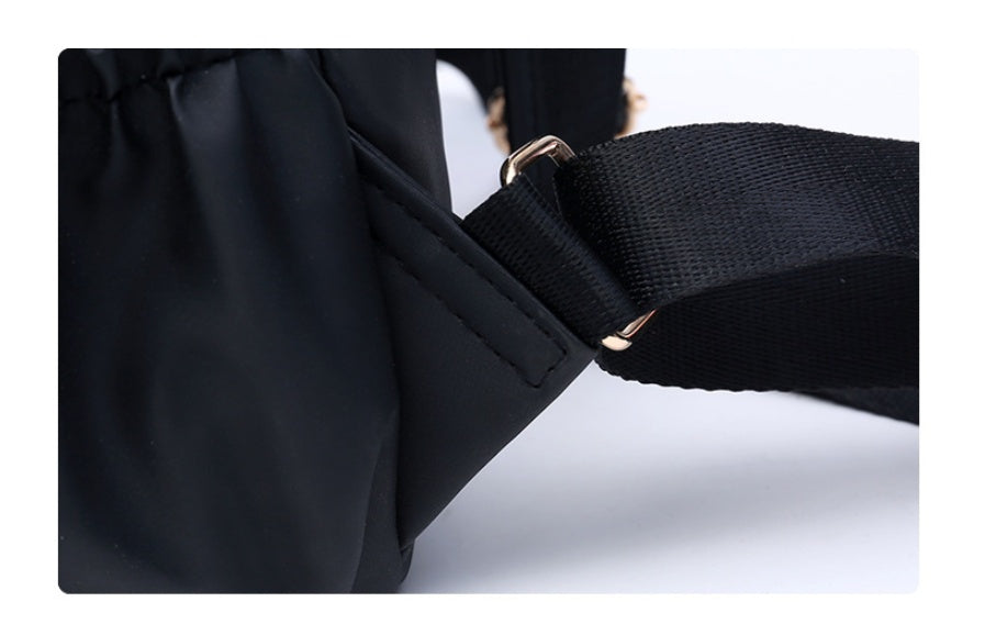 Black waterproof Oxford backpack for women by Ancient Energy, featuring a stylish and durable school bag design.