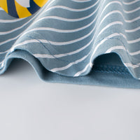 Children's short-sleeved t-shirt for boys by Ancient Energy, featuring a colorful playful design on soft fabric.