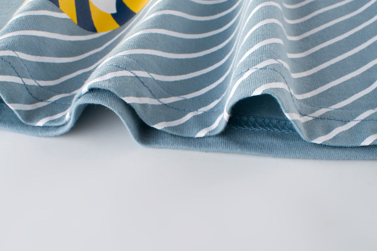 Children's short-sleeved t-shirt for boys by Ancient Energy, featuring a colorful playful design on soft fabric.