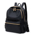 Black waterproof Oxford backpack for women by Ancient Energy, featuring a stylish school bag design with multiple compartments.