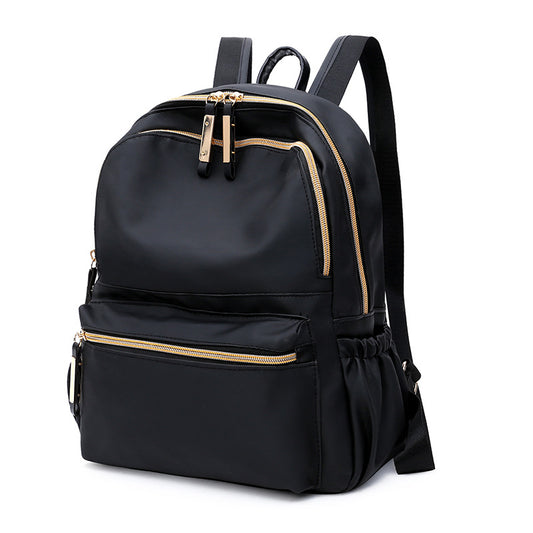 Black waterproof Oxford backpack for women by Ancient Energy, featuring a stylish school bag design with multiple compartments.