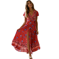 Tropical Bloom Maxi Dress by Mandotos International featuring vibrant floral pattern and flowing fabric for a summery look.