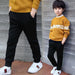 Children's Western-style spring and autumn outfit by Ancient Energy, featuring a stylish and comfortable look for big kids.