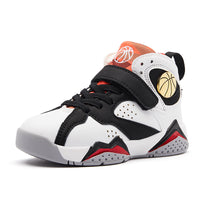 Young boy wearing Ancient Energy elementary school boys running shoes, featuring sporty design in vibrant colors.