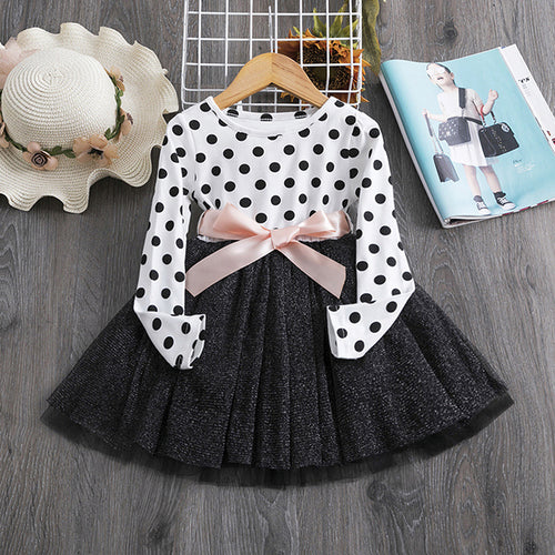Ancient Energy polka dot princess dress for girls, featuring a cute design and ruffled sleeves, perfect for special occasions.