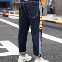 Ancient Energy kids' casual straight pants in neutral color, featuring a comfortable fit and simple design for everyday wear.