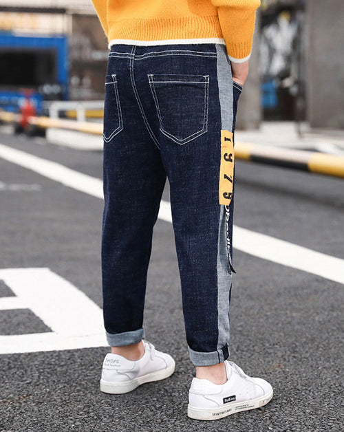 Ancient Energy kids' casual straight pants in neutral color, featuring a comfortable fit and simple design for everyday wear.