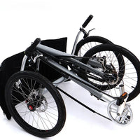 Lying on a tricycle, 3 shifting disc brakes, folding on a recumbent bike, casual commuting, riding a recumbent bicycle