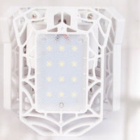 Ancient Energy 60W super bright deformable LED light for gym, warehouse, or garage, emitting 6000 lumens of clear white light.