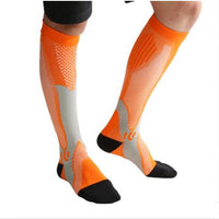 Ancient Energy men's and women's athletic compression socks designed to boost stamina and improve circulation during exercise.