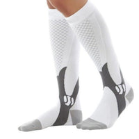 Ancient Energy athletic compression socks for men and women, designed to boost stamina and improve circulation during activity.