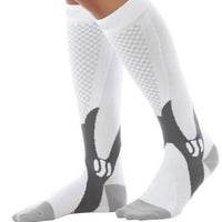 Ancient Energy athletic compression socks for men and women, designed to boost stamina and improve circulation during exercise.