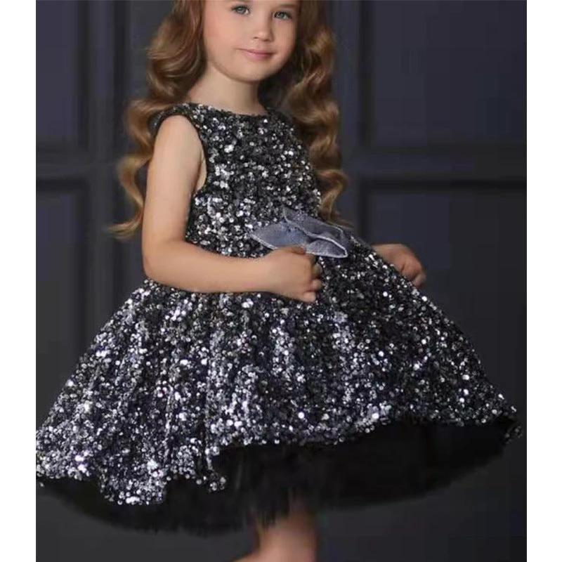 Girls walking in an Autumn/Winter one-shoulder dress by Ancient Energy, stylish and cozy for cooler seasons.