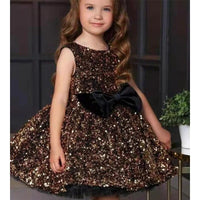 Girls walking in an autumn/winter one-shoulder dress by Ancient Energy, stylish girls' dress for cooler seasons.