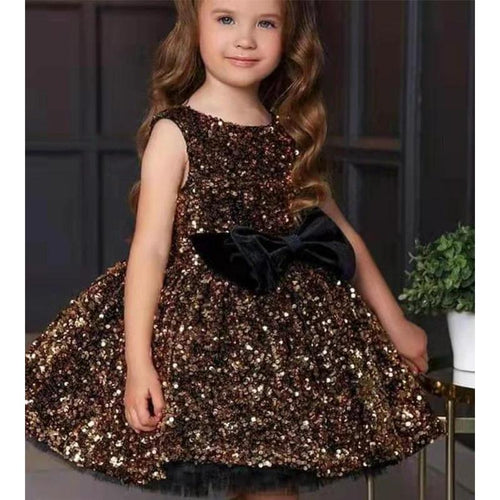 Girls walking in an autumn/winter one-shoulder dress by Ancient Energy, stylish girls' dress for cooler seasons.