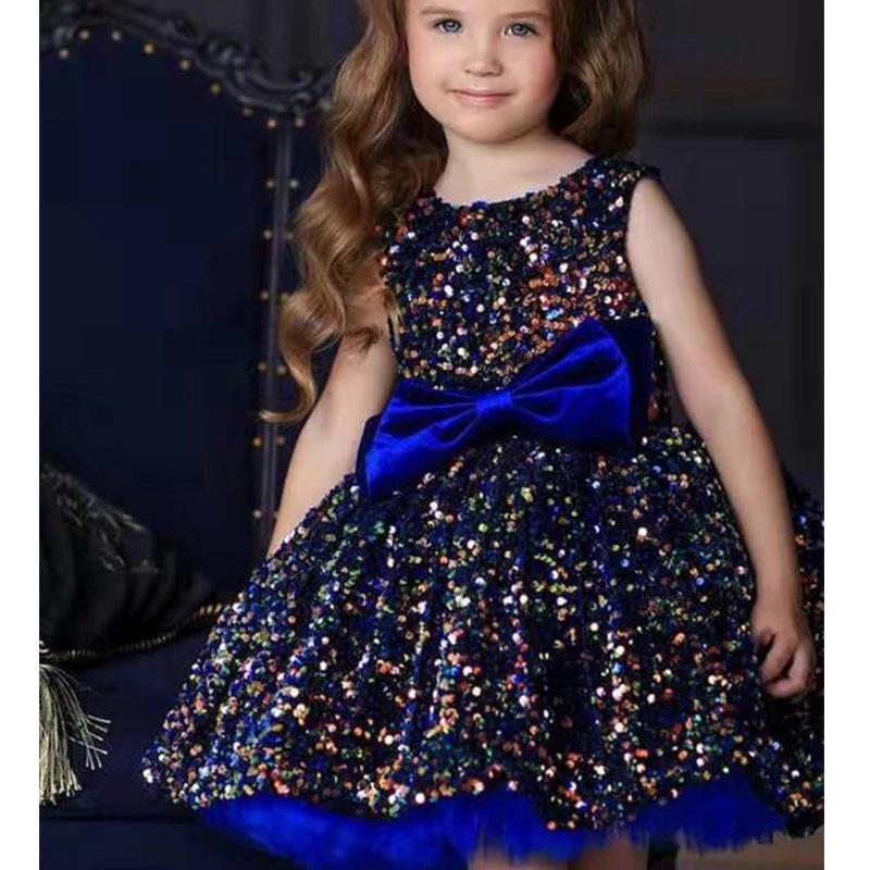 Girls walking in an Autumn/Winter one-shoulder dress by Ancient Energy, featuring warm fabric and stylish design.