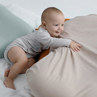 Ancient Energy baby nest bed and portable cotton crib for newborns, infant travel cradle with cushioned support.