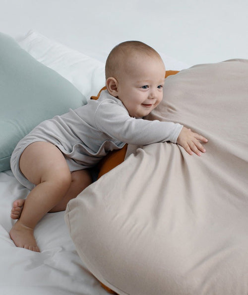 Ancient Energy baby nest bed and portable cotton crib for newborns, infant travel cradle with cushioned support.