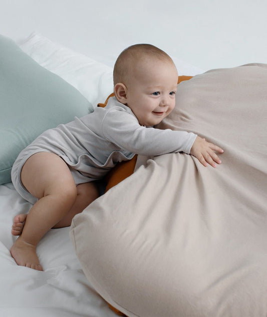 Ancient Energy baby nest bed and portable cotton crib for newborns, infant travel cradle with cushioned support.