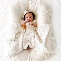 Ancient Energy baby nest bed crib for newborns, portable cotton infant cradle with cushion for travel and comfort.