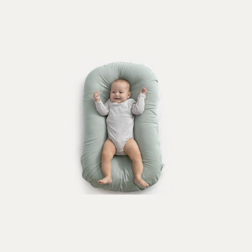 Ancient Energy baby nest bed crib with soft cotton cushion, portable infant cradle for newborns and travel use.