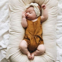 Ancient Energy baby nest bed and crib for newborns, portable cotton infant cradle with cushioned sides for cozy comfort.