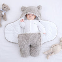 Baby quilted sleeping bag wrapper by Ancient Energy, soft padded design for cozy comfort and secure sleep for infants.