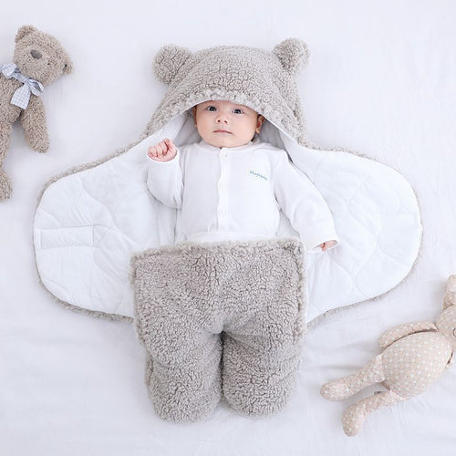 Baby quilted sleeping bag wrapper by Ancient Energy, soft padded design for cozy comfort and secure sleep for infants.