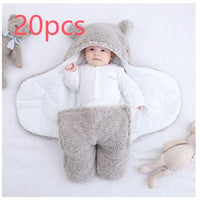 Baby quilted sleeping bag wrapper from Ancient Energy, soft padded wrap for keeping infants cozy and warm during sleep.