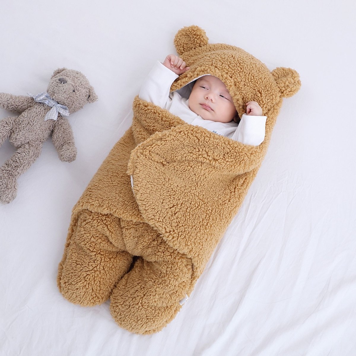 Baby quilted sleeping bag wrapper by Ancient Energy, soft padded design for cozy comfort and warmth for infants.