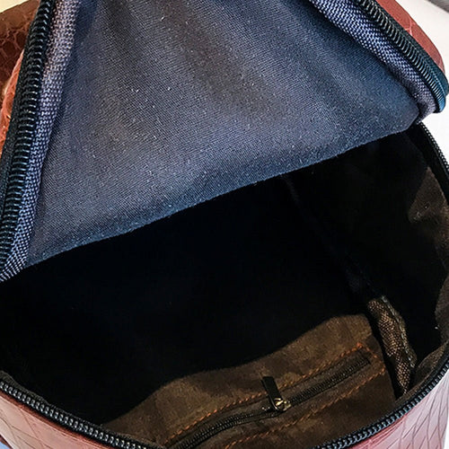 Casual Wild Women's Small Backpack by Ancient Energy featuring a compact design with adjustable straps and stylish details.