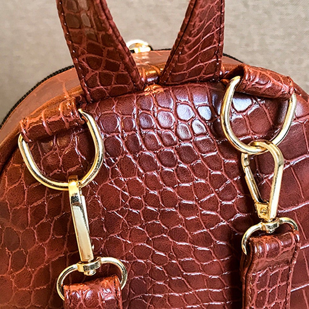 Casual Wild Women's Small Backpack by Ancient Energy, featuring a compact design with adjustable straps and a stylish pattern.