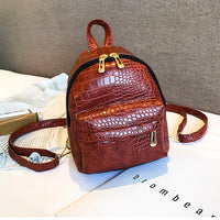 Ancient Energy casual women's small backpack with wild design, featuring adjustable straps and compact style for everyday use.