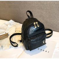 Casual Wild Women's Small Backpack by Ancient Energy, featuring a stylish design with adjustable straps and compact storage.