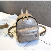 Casual Wild Women's Small Backpack by Ancient Energy, featuring a compact design with adjustable straps and a stylish, outdoor-inspired look.