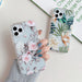 Watercolor banana leaf and floral design by Ancient Energy, ideal for protecting mobile phone cases.