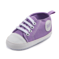 Ancient Energy baby boys and girls canvas sports sneakers with soft soles and anti-slip design for first walkers and toddlers.
