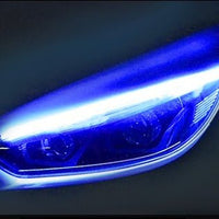 Ancient Energy car LED daytime running light strip and turn signal LED strip installed on a vehicle for enhanced visibility.