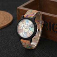 Vintage leather women's quartz wrist watch by Ancient Energy, showcasing a classic design with a round clock face and leather strap.