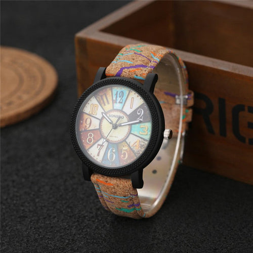 Vintage leather women's quartz wrist watch by Ancient Energy, showcasing a classic design with a round clock face and leather strap.