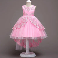 Children's princess dress by Ancient Energy featuring a pink satin gown with lace and ribbon details, perfect for special occasions.