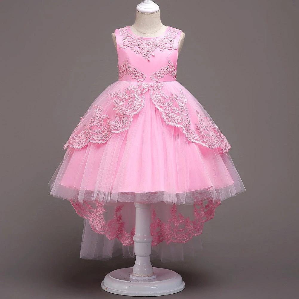 Children's princess dress by Ancient Energy featuring a pink satin gown with lace and ribbon details, perfect for special occasions.