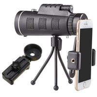 Ancient Energy compatible monocular telescope with zoom, built-in compass, phone clip, and tripod for outdoor viewing.