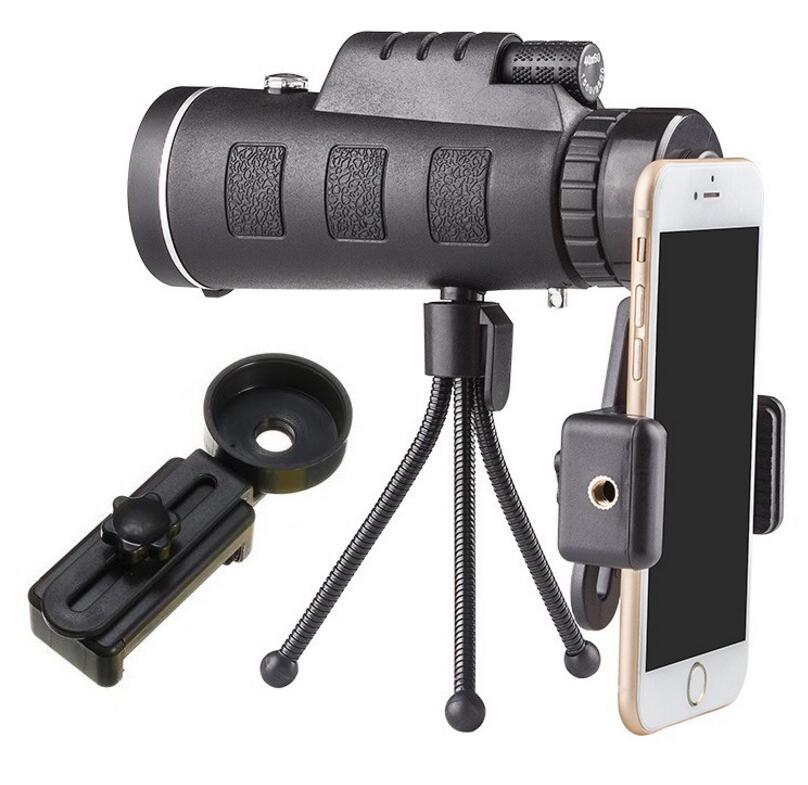 Ancient Energy compatible monocular telescope with zoom, built-in compass, phone clip, and tripod for outdoor viewing.