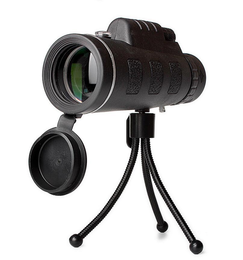 Ancient Energy compatible monocular telescope with zoom, built-in compass, phone clip, and tripod for outdoor viewing activities.