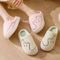 Pair of Cozy Striped Cat Slippers for Couples by Ancient Energy, plush warm indoor house shoes with non-slip soles.