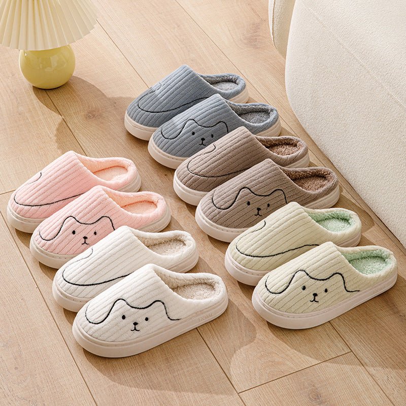 Pair of cozy striped cat slippers for couples by Ancient Energy, featuring non-slip soles and plush interior for indoor comfort.